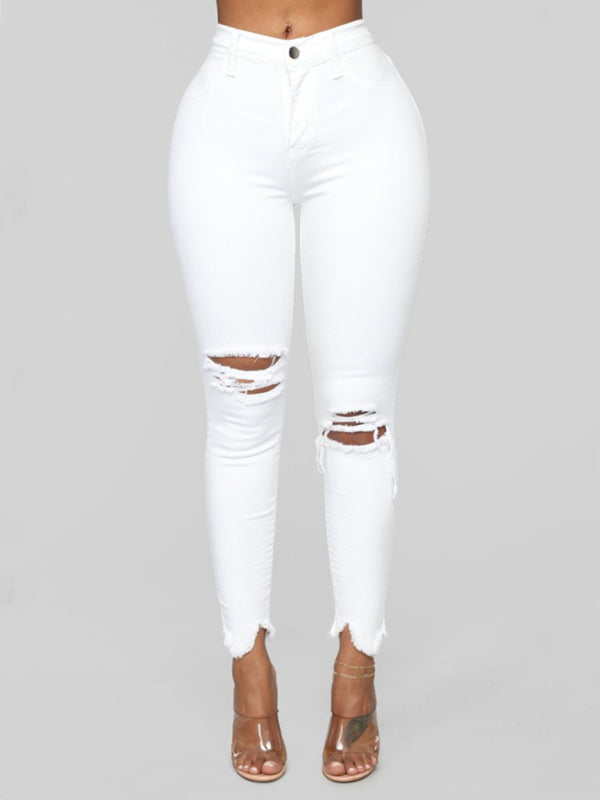 Women's elastic ripped solid color jeans