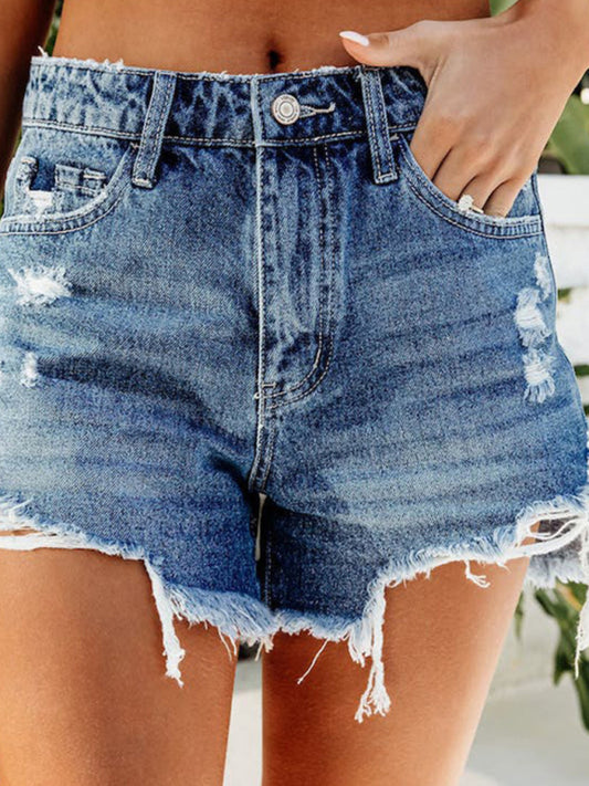 Comfortable denim shorts with frayed tassels and holes