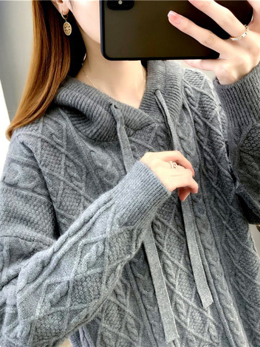 महिलाओं का ट्विस्ट ढीला हुड वाला बुना हुआ स्वेटर