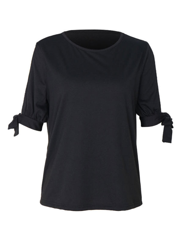Women's black top with hollow shoulders
