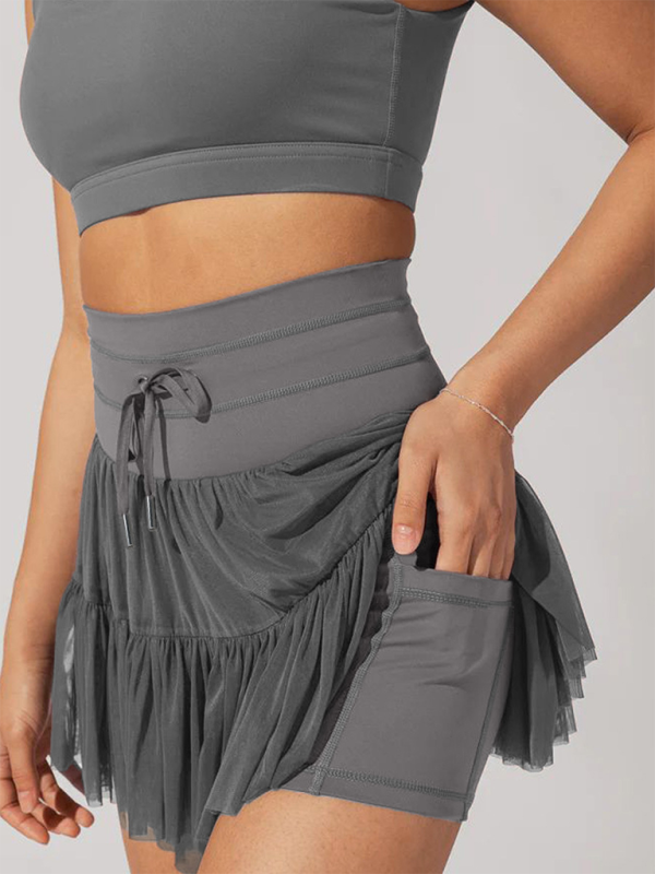 Anti-exposure pants with pockets pleated skirt