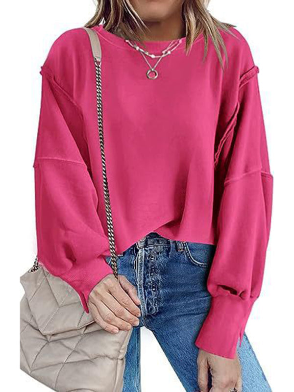 Women’s round neck loose side slit long sleeve sweatshirt