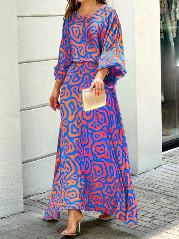 Loose printed long-sleeved top and high waist skirt two-piece set
